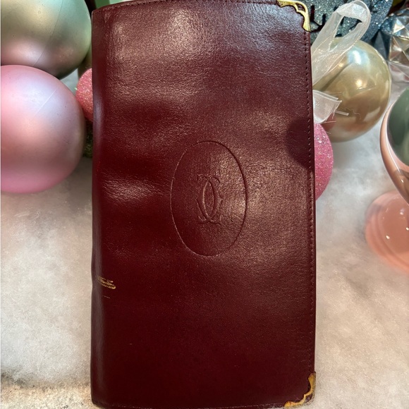 Cartier Handbags - Cartier Burgundy Leather Wallet